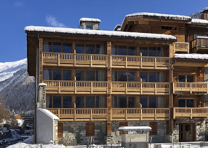 Hotel Ski Lodge - Chambres & Appartements - Village Montana Val-d'Isere